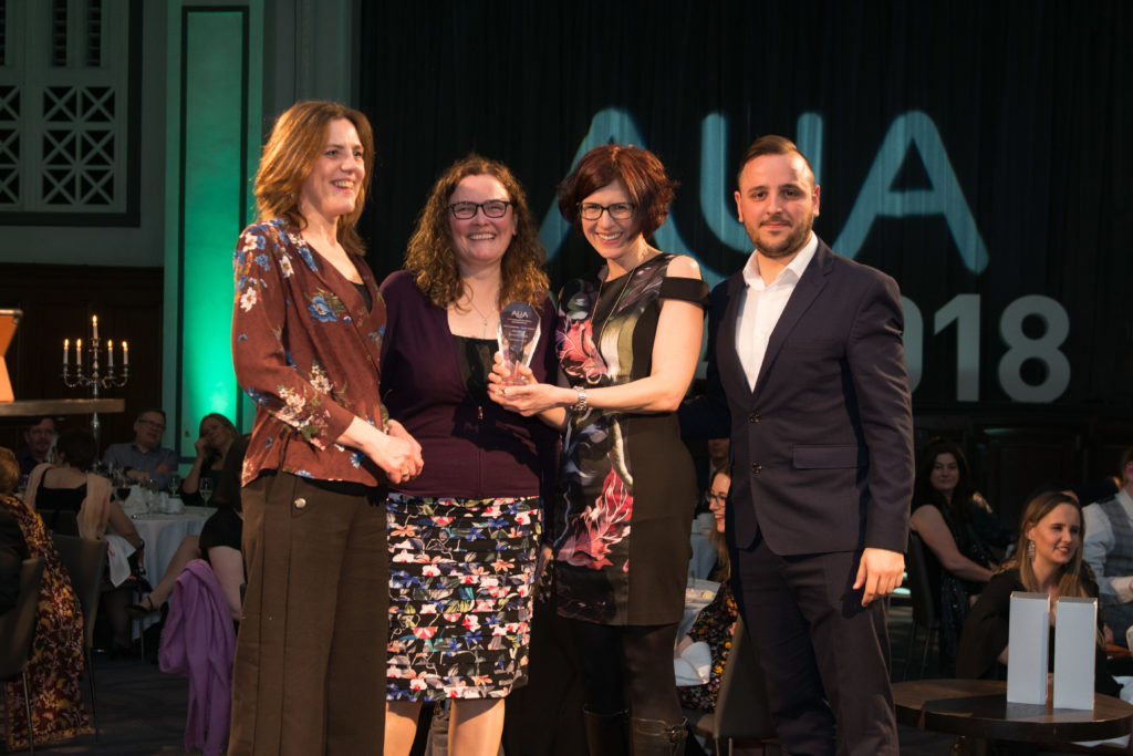 AUA Bath Team receiving the Networks Team Award, presented by Adam Alexander from Achievability 
